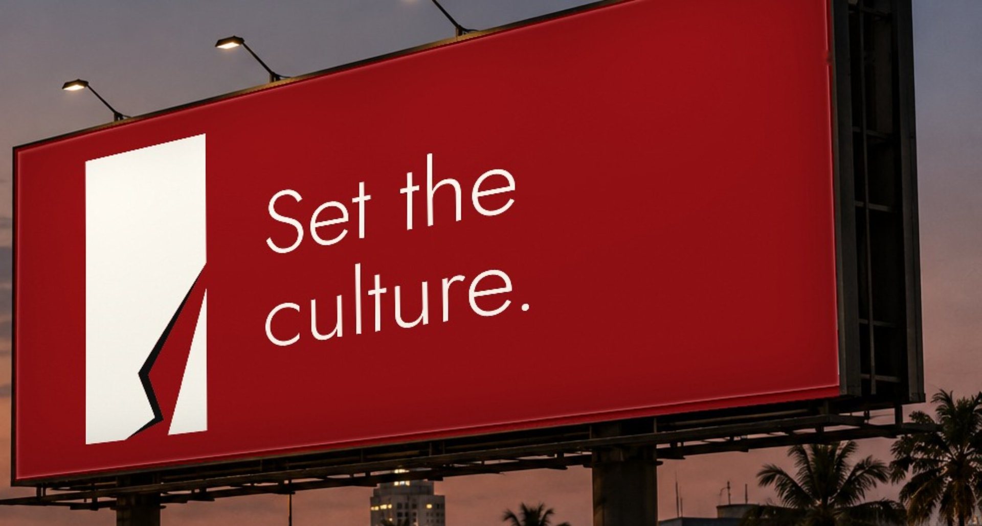 Red House of Adrenalene billboard reading “Set the culture.” against a Lagos sky at dusk